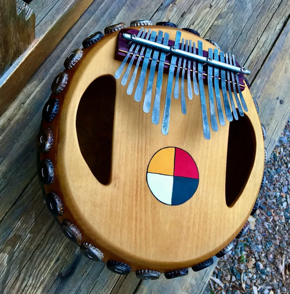 A wooden instrument with a cross on it, known as the Ilimba.