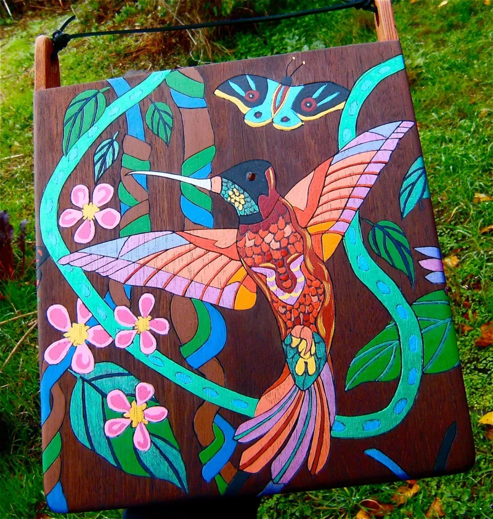 An intricately painted hummingbird perched on a wooden board, inspired by the vibrant rhythms of Ngoma, African music.