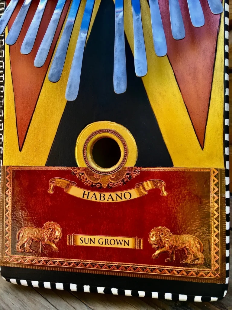 An accordion with a sun crown on it, also known as a Lamellaphone.