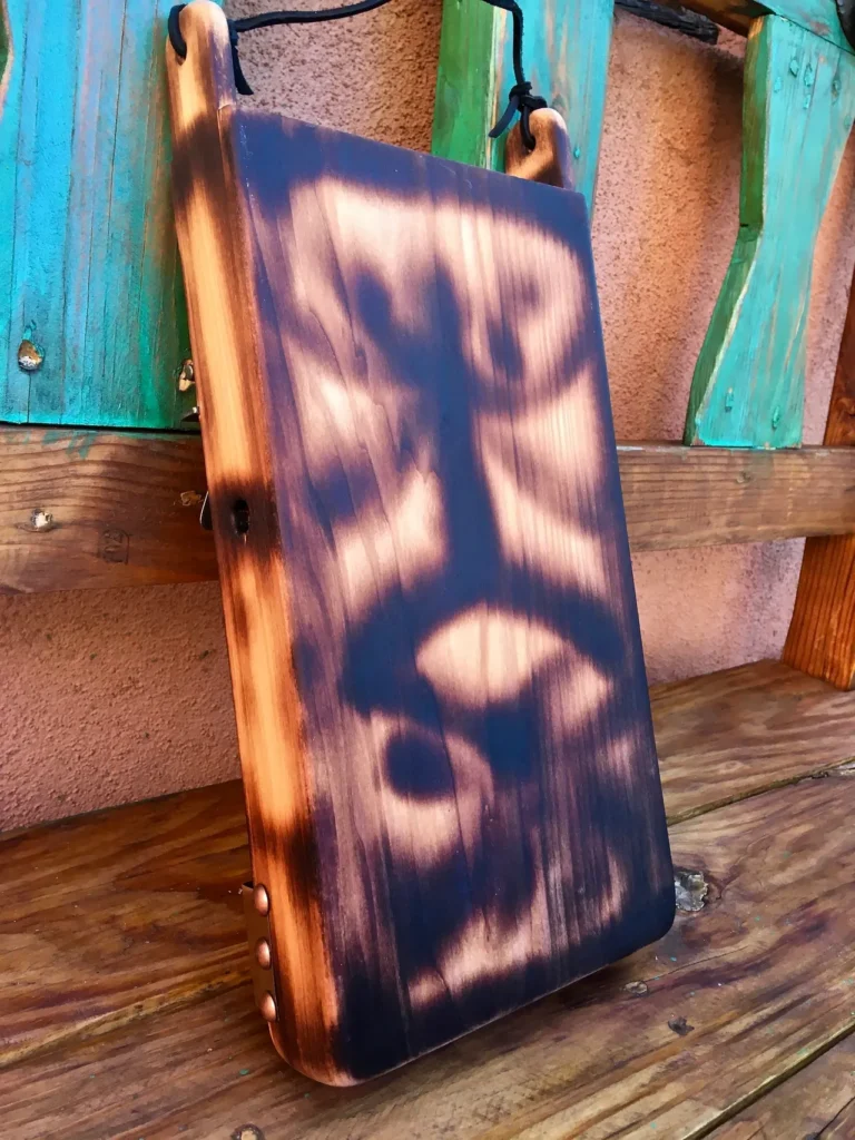 A wooden box with a Lamellaphone image on it.