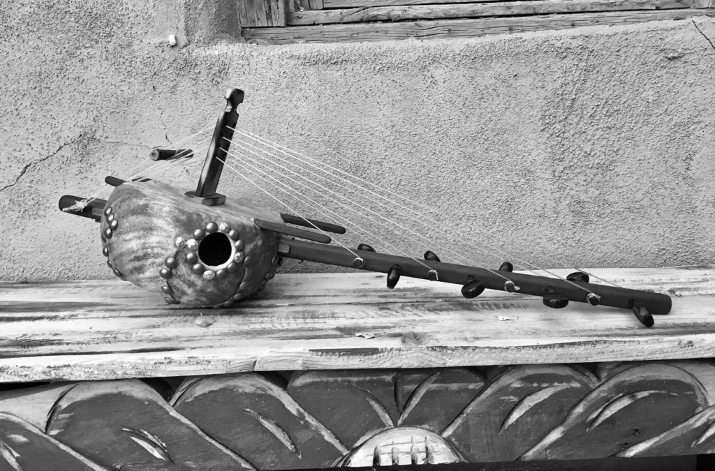 A black and white photograph of an Ngoma, an African musical instrument.