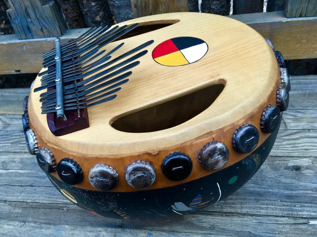 An Ilimba drum adorned with a multitude of beads.