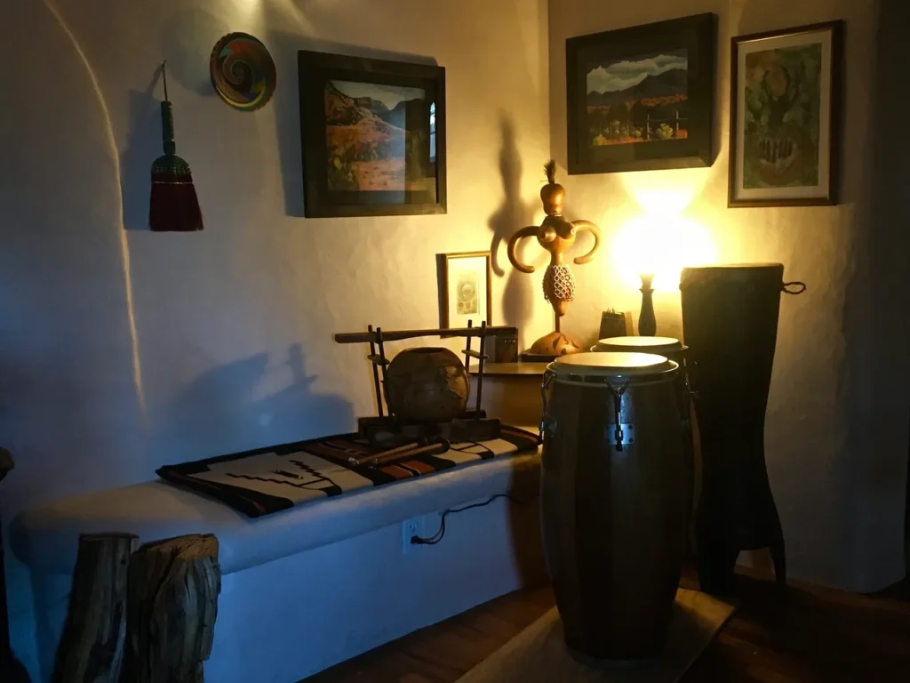 A room with a drum and other items such as Ilimba.